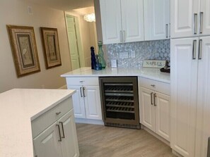 Coffee/tea maker, toaster, dining tables