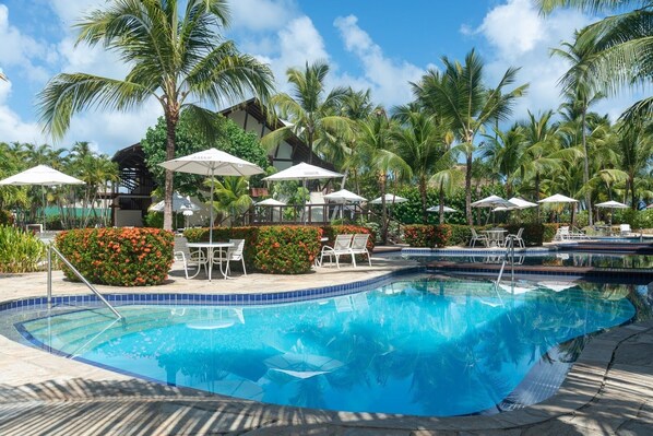 15 outdoor pools, open 9:00 AM to 10:00 PM, pool umbrellas, sun loungers