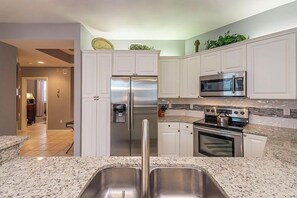 Coffee/tea maker, toaster, dining tables