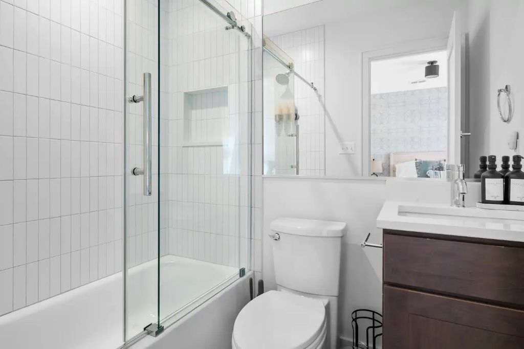 Combined shower/tub, hair dryer, towels, soap