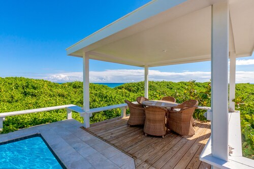 Headquarters: Coastal Retreat with Ensuite Bedrooms and Private Pool Dock