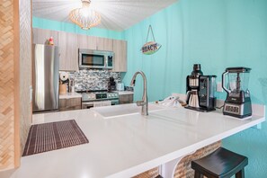 Fridge, microwave, stovetop, coffee/tea maker - Just Beachy: Garden View Condo with AC at Plantation Hale D7 (Kapaa)