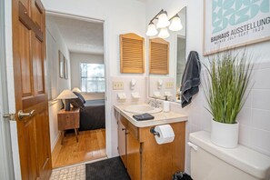 Combined shower/bathtub, hair dryer, towels, soap