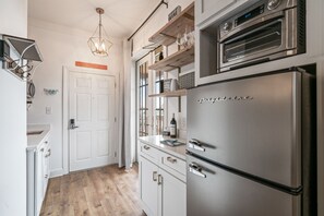 Fridge, microwave, coffee/tea maker, toaster