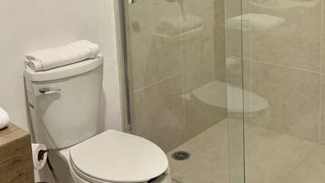 Shower, hair dryer, bathrobes, towels