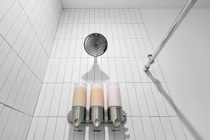 Combined shower/tub, hair dryer, towels, soap
