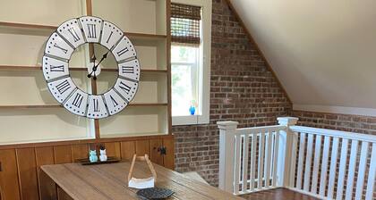 Historic Steckel carriage house with picturesque landscaping