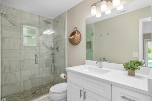 Combined shower/tub, hair dryer, towels, soap