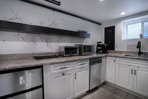 Fridge, microwave, dishwasher, coffee/tea maker