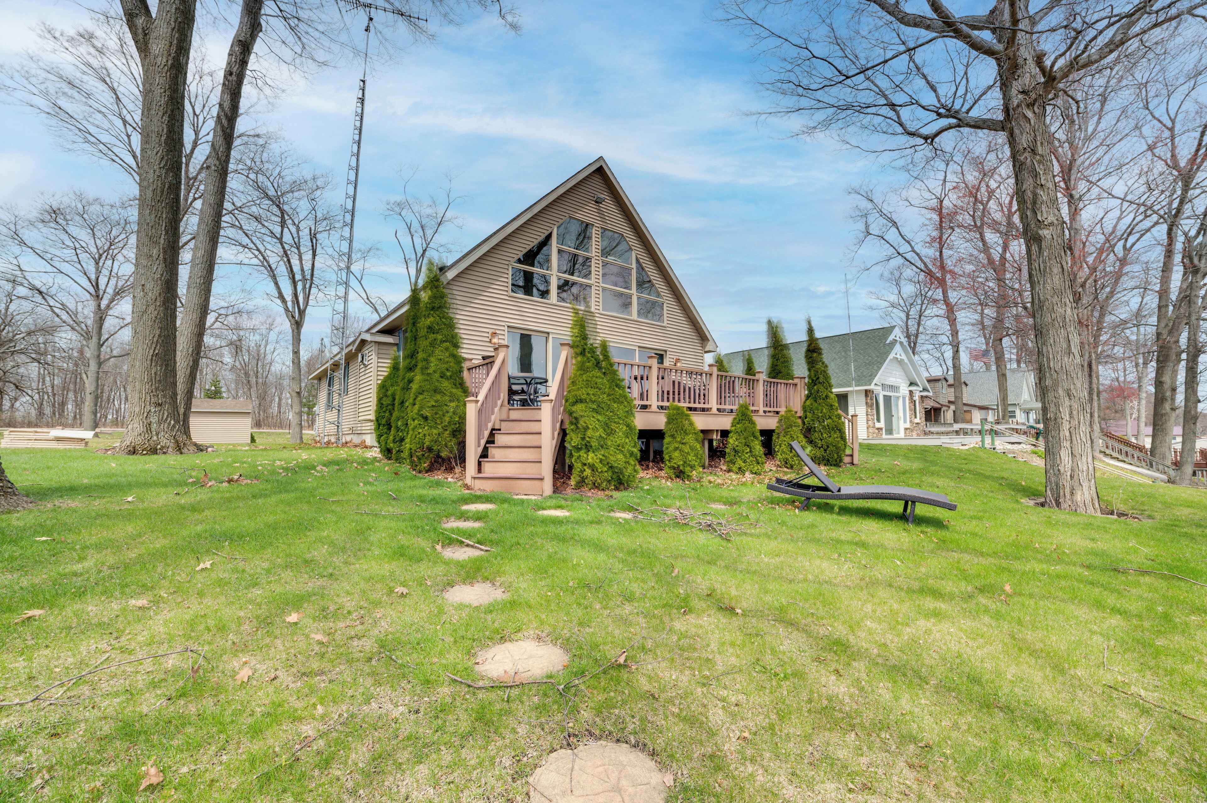 Tawas City Vacation Rental | 3BR | 2.5BA | Stairs Required | 1,977 Sq Ft