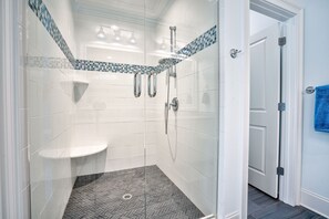 Combined shower/tub, hair dryer, towels, soap