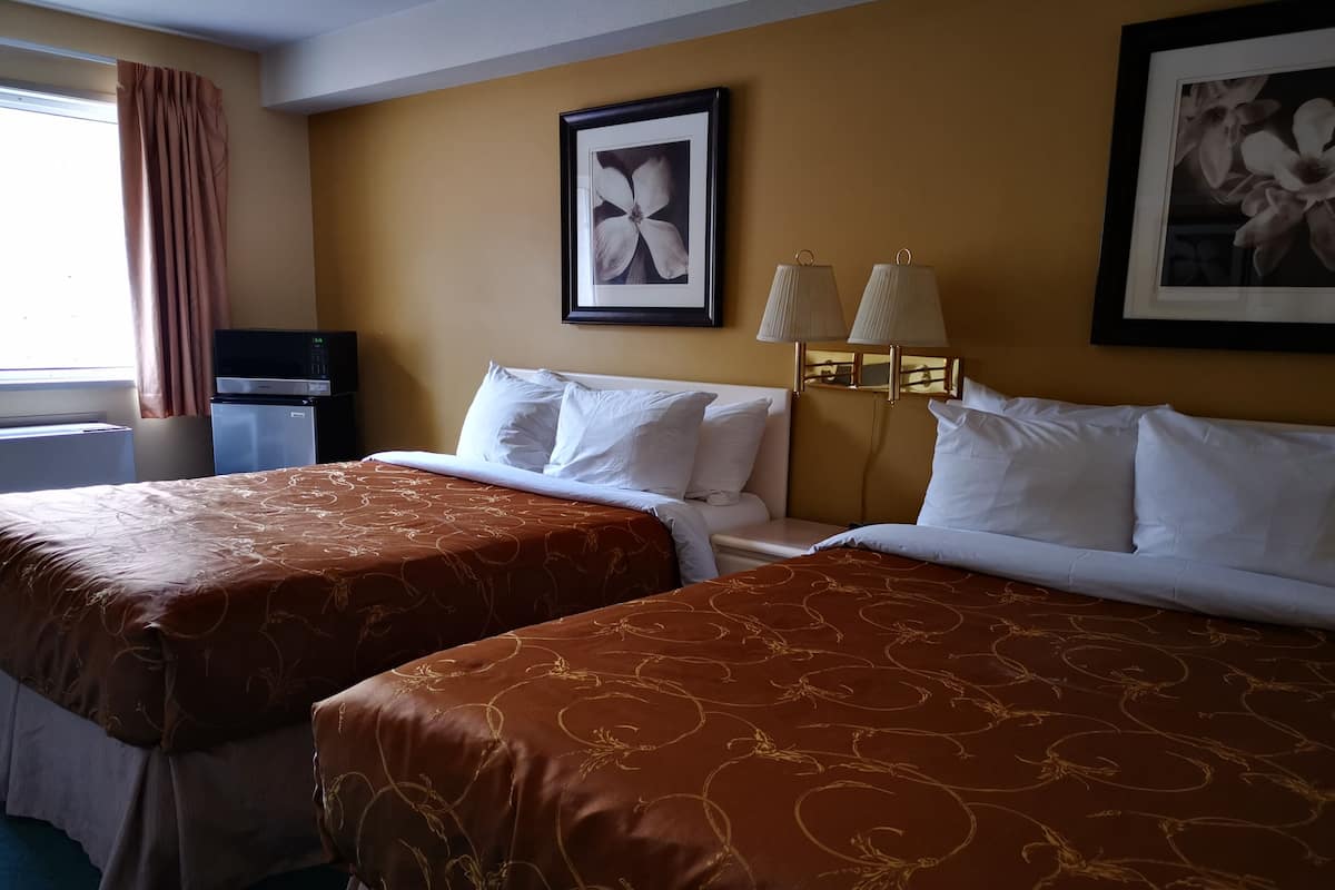 Desk, laptop workspace, free WiFi, bed sheets