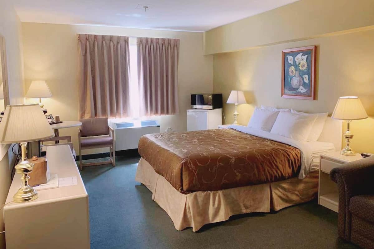 Desk, laptop workspace, free WiFi, bed sheets