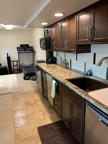 Sundance on the prairie. Light &open 2bdrm walkout basement apt w/mountain views