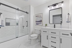 Combined shower/tub, hair dryer, towels, soap - Contemporary-Modern Smart-Home in Paradise, on Petco Park! (San Diego)