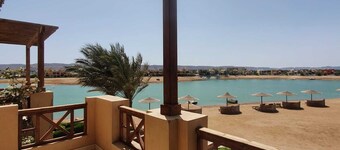 2 BR flat overlooking open lagoon and private pool