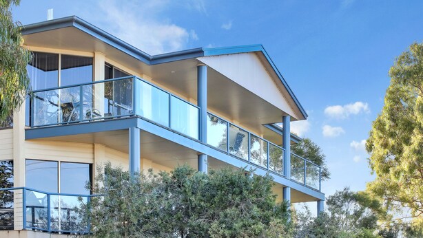 A modern two-story building with large windows and balconies. - Sorrento Apartments Merimbula (Merimbula)