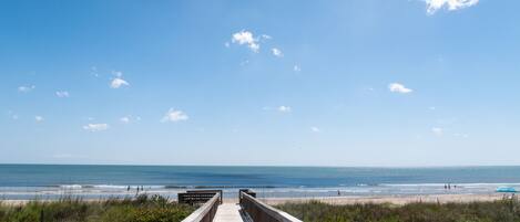 On the beach, sun loungers, beach towels
