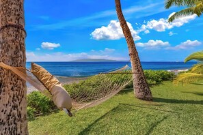 On the beach, sun loungers, beach towels