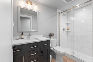 Combined shower/tub, hair dryer, towels, soap