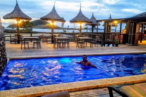 Outdoor pool, open 8:00 AM to 9:00 PM, pool umbrellas, pool loungers