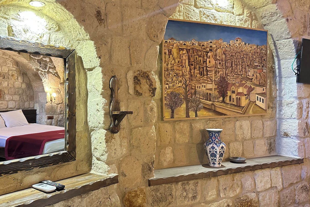 Habitació triple Deluxe, aire condicionat | Roba de llit d'alta qualitat, minibar i decoració individual