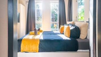 3 slaapkamers, een strijkplank/strijkijzer, wifi, beddengoed