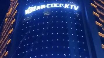 A building with a sign that reads "COCKTV".