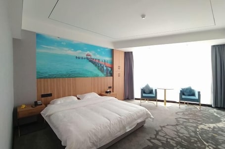 Room. Yudong Tianmao Apartment Hotel