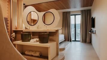 Suite Studio Deluxe | Minibar, coffres-forts dans les chambres, rideaux occultants