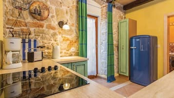 Fridge, stovetop, dining tables