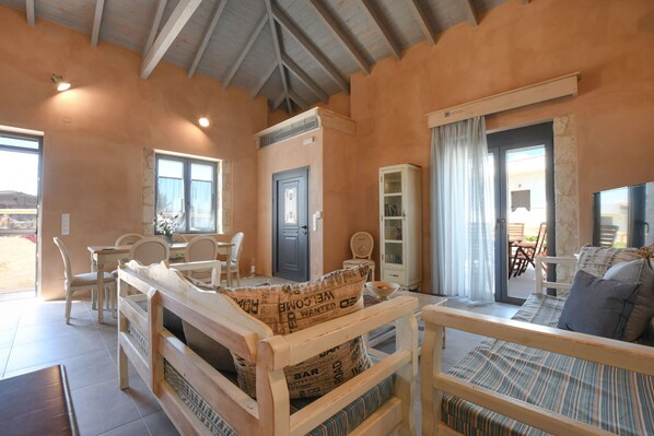 Chambre quadruple luxueuse | Aire de séjour