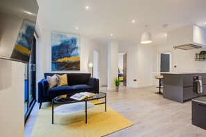 Appartement, 2 grands lits | Salle de séjour