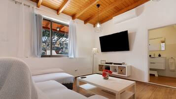 2 dormitorios, tabla de planchar con plancha, wifi gratis y ropa de cama