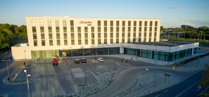 Situated by the water, this hotel offers a symmetrical design with large windows.
