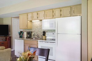 Condo, 1 King Bed, Patio, Garden View (Abby Lane Leisure Time) | Private kitchen | Coffee/tea maker