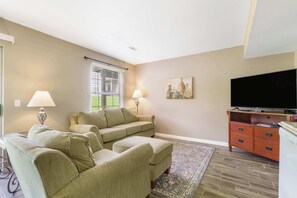 Condo, 1 King Bed, Patio, Garden View (Abby Lane Leisure Time) | Living area | 42-inch flat-screen TV with digital channels