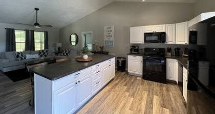 Newly remodeled, handicap accessible overlooking pool , play area