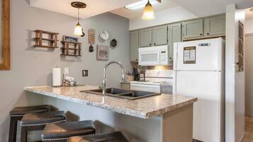 Condo, Multiple Beds, Patio, Mountain View (Black Bear Lodge) | Private kitchen | Coffee/tea maker