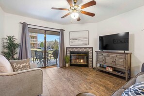 Condo, Multiple Beds, Patio, Garden View (Bunker Ridge Rendezvous) | Living area | 42-inch flat-screen TV with digital channels, fireplace - Bunker Ridge Rendezvous - Branson - Condo in Pointe Royale (Branson)