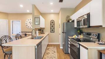 Condo, Multiple Beds, Pool Access, Garden View (Fairview Escape) | Private kitchen | Coffee/tea maker