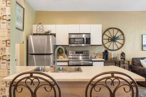 Condo, Multiple Beds, Pool Access, Garden View (Fairview Escape) | Private kitchen | Coffee/tea maker