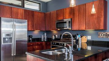 Condo, 1 King Bed, Balcony (Good Vibrations) | Private kitchen | Fridge, microwave, oven, stovetop