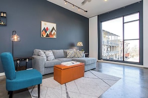 Condo, 1 King Bed, Balcony (Good Vibrations) | Living room | 42-inch flat-screen TV with digital channels