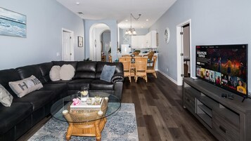 Condo, Multiple Beds, Balcony, Garden View (Grand Getaway at Bahama Bay) | Living area