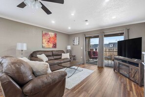 Condo, Multiple Beds, Patio, Garden View (Makin' Memories) | Living area | 42-inch flat-screen TV with digital channels, fireplace - Makin' Memories - Community Pool (Branson)