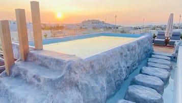 Seasonal outdoor pool, pool umbrellas, pool loungers
