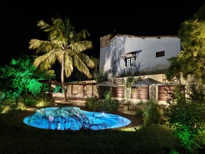 Outdoor pool, open 8:00 AM to 8:00 PM, pool umbrellas, pool loungers