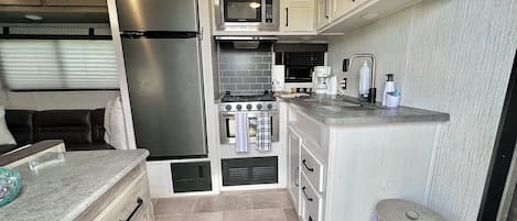 Fridge, microwave, oven, stovetop