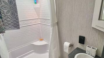 Shower, towels, soap, shampoo
